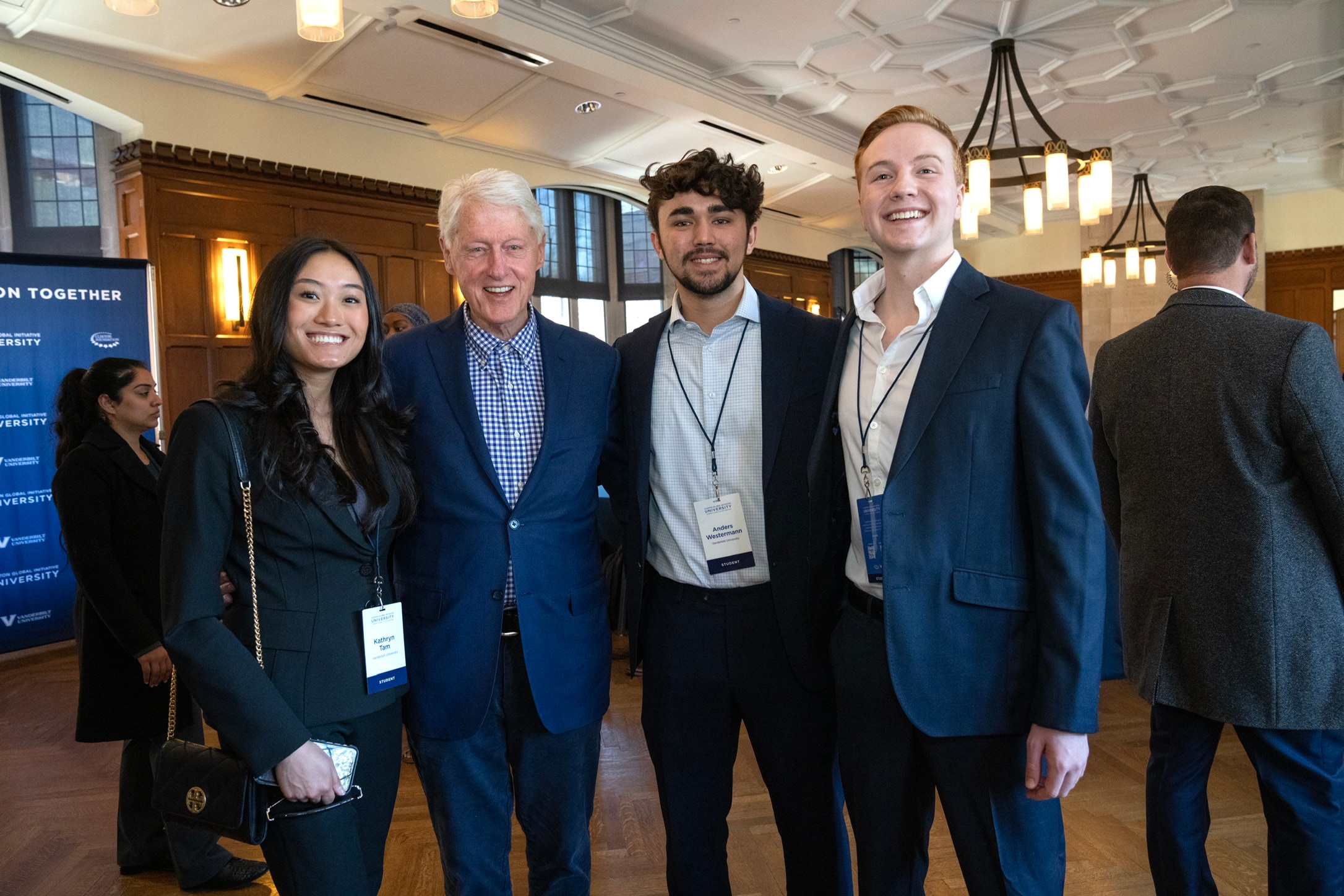 Tommy Pennington, Anders Westermann, and Kat Tam with President Bill Clinton at the Clinton Global Initiative Summit, 2023